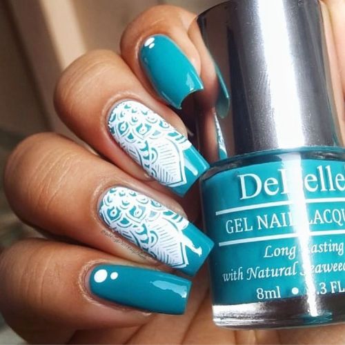 Nail art glorified with DeBelle gel nail color Turquoise Blue Buy online T DeBelle Cosmetix online store with cod facility.
