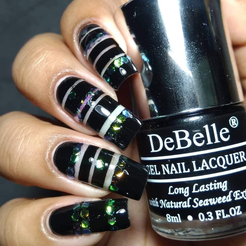 Bring out the artist in you and create ripples in nail art with DeBelle gel nail color Lucxe Noir the awome black shade. Available online at DeBelle Cosmetix online store at affordable price.