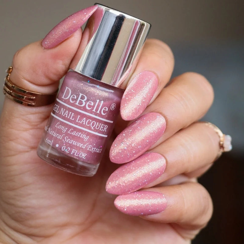 The pinkish Mauve with a glitter-DeBelle gel nail color Magnetic Madelyn. Shop online at DeBelle Cosmetix online store.