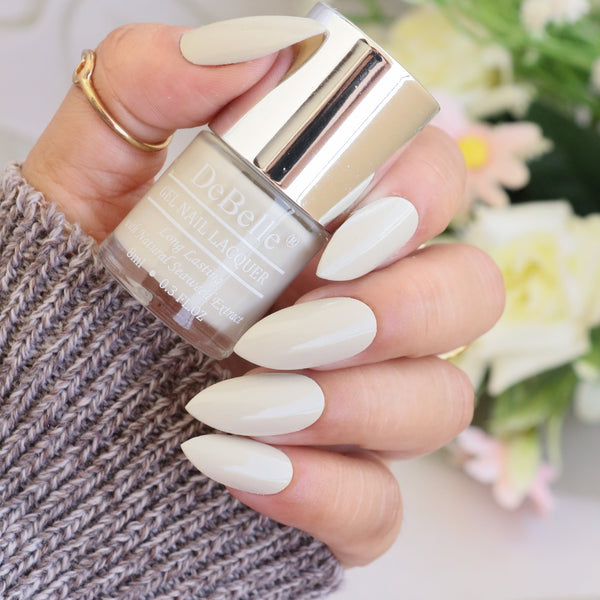 debelle light beige nail polish with a glossy look and a beautifully manicurenail 
