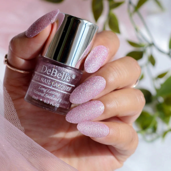 Nails adorned with Lavender and Holo Glitter Nail Polish: A playful and enchanting choice for a whimsical nail art