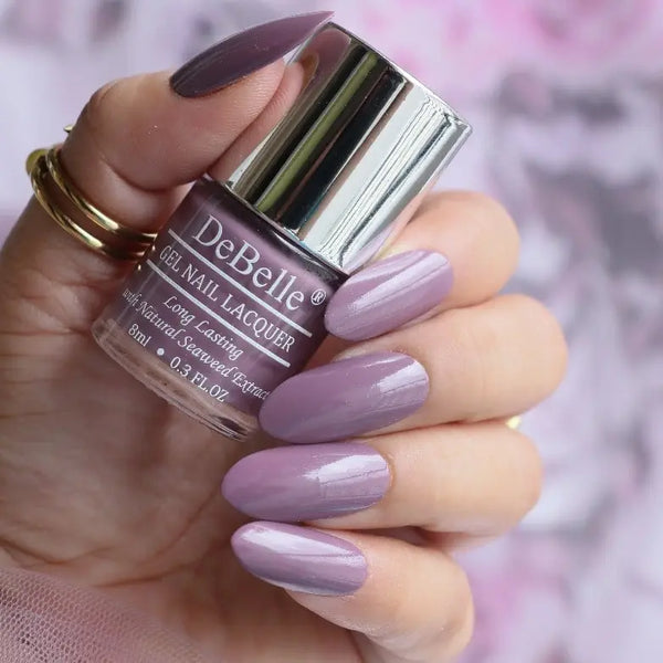 "Debelle Dark Mauve Nail Enamel: A rich and alluring nail color that commands attention and style