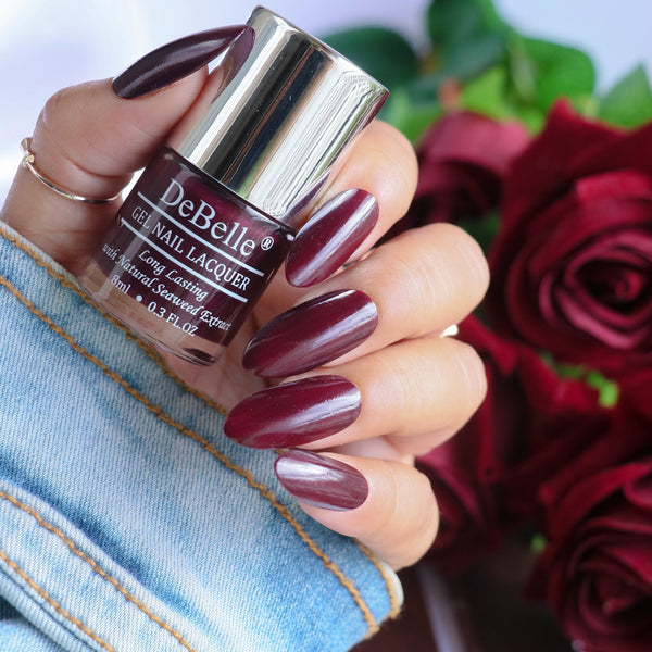 Awesome nails with DeBelle gel nail color Glamorous Garnet the deep maroon shade. Shop online for this  shade enriched with hydrating seaweed extract at DeBelle Cosmetix online store.