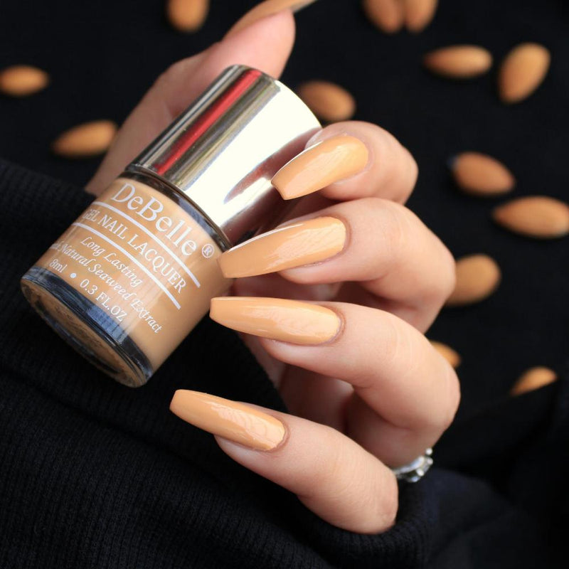 The look of elegance with Debelle gel nail color Almond Blush. Available at Debelle cosmetix online store.