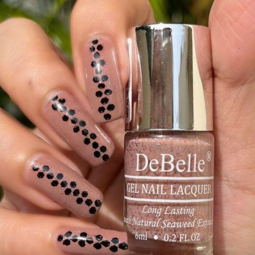 Nail art looks beautiful with DeBelle gel nail color Angelic Saira. Buy online at DeBelle Cosmetix online store.