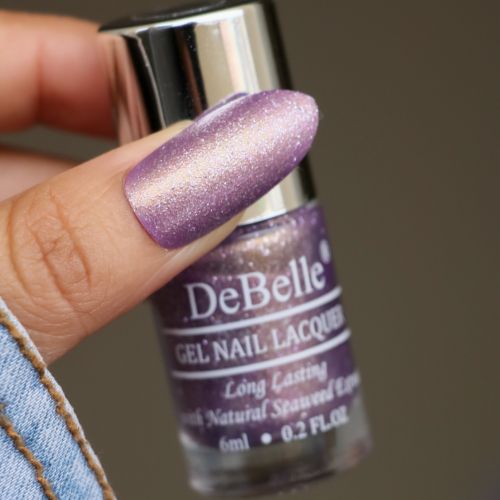 Appealing nails with DeBelle purple with silver glitter shade Appealing Aura.Buy onlineat DeBelle Cosmetix online store.h