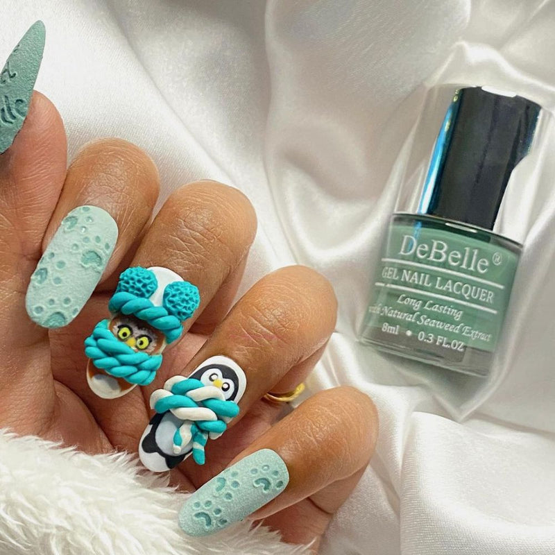 Cute nail art with DeBelle gel nail color Asparagus fern the sea green shade.. Available at DeBelle cosmetix online store. 