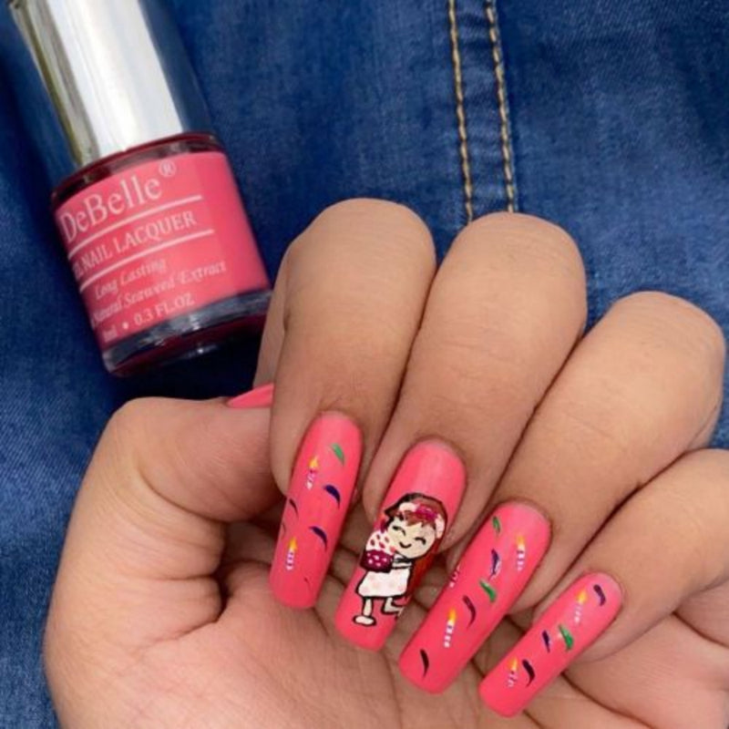 Creative nail art with DeBelle gel nail color Bebe Kiss the hot pink shade. Buy online at DeBelle Cosmetix online store.