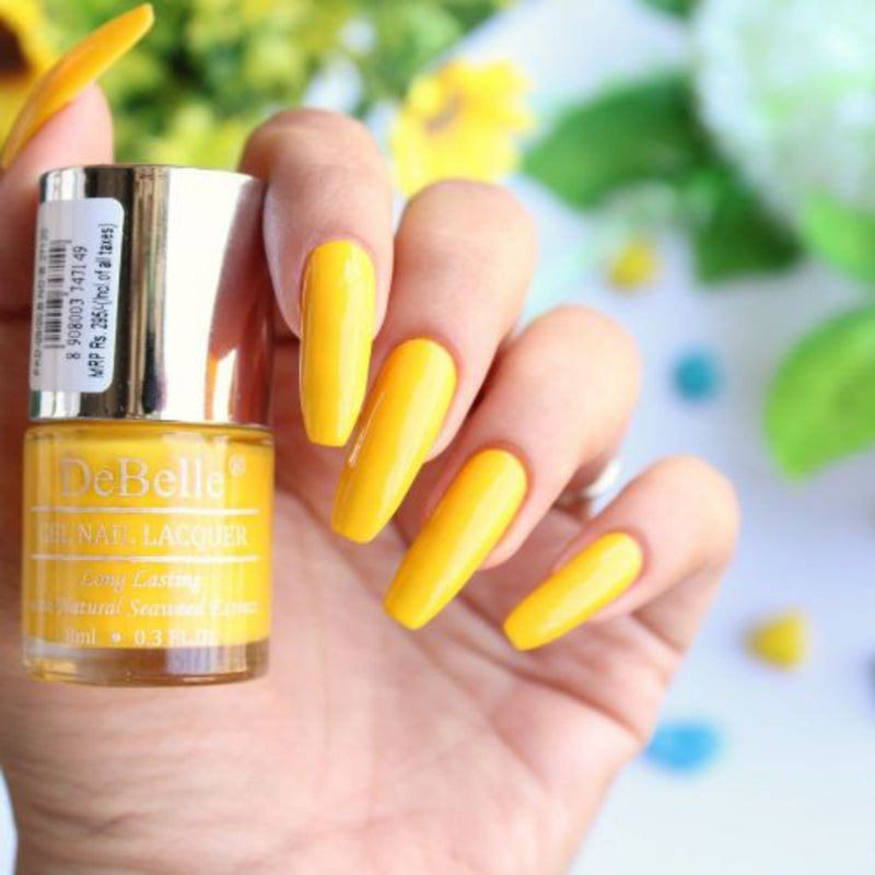 The bright look with DeBelle gel nail color Caramelo Yellow. Available at DeBelle Cosmetix online store.