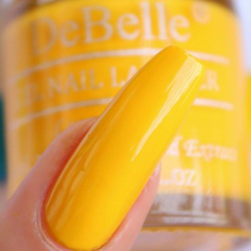 Bright nails with DeBelle gel nail color  Caramelo yellow on your nails . Shop online for this bright yellow shade at DeBelle Cosmetix online store.