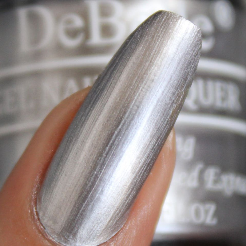 Silver nails with DeBelle gel nail color Chrome silver. Buy this metallic silver shade enriched with hydrating seaweed extract at DeBelle Cosmetix online store.