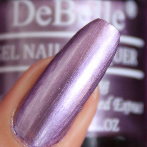Dazzling nails with DeBelle gel nail color Chrome wine the metallic purple shade. Buy from the comfort of your home at DeBelle Cosmetix online store.