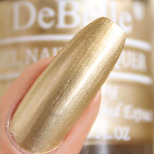 Dazzling nails with DeBelle gel nail color Chrome Gold. This gold shade with a metallic sheen enriched with hydrating seaweed extract  is available at DeBelle Cosmetix onlinbe store.