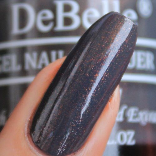 This grey with copper specks DeBelle gel nail color  Copper  Glaze will surely make your nails look awesome. This shade enriched with hydrating seaweed extract is available  at DeBelle Cosmetix online store with COD facility.