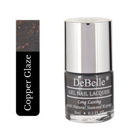 Get your naisl painted in this DeBelle gel nail color  Copper  Glaze and  get bouquets of compliments pouring in. This grey shade with copper specks enriched with hydrating  seaweed extract is available at DeBelle cosmetix online store with COD facility.