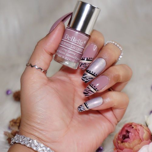 Nail art looks great with DeBelle gel nail color Blissful Elizabeth the light pink  mauve shade. Shop online at DeBelle Cosmetix online store.