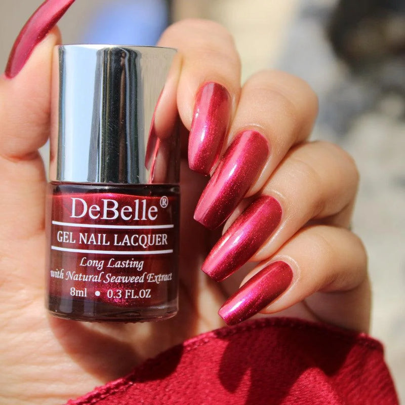 For weddings and parties - DeBelle gel nail color Antares the deep maroon pearl shade. Available online with COD facility.
