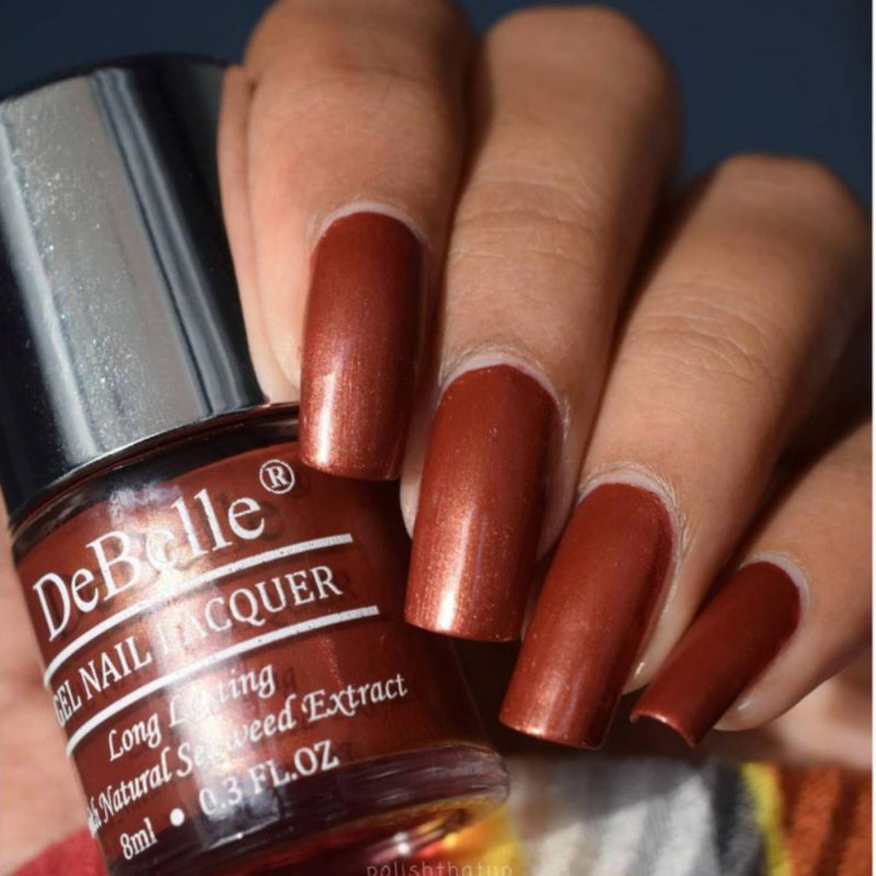 Nail polish with metallich finishes and dual tones, festive shades to elevate style for any occassion. 