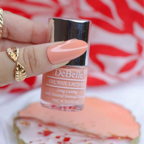 Sheer elegance at your nail tips with DeBelle gel nail color Dear Dahlia the orange with peach blend. Shop online at DeBelle Cosmetix online store.