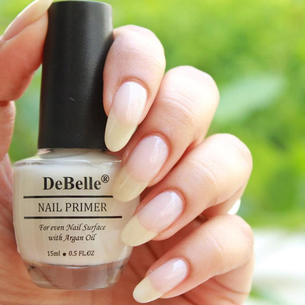 nai primer that rotects the natural nail surface , nail primer that  minimizes staining from coloured polishes