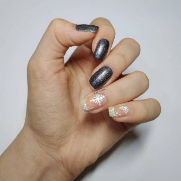 Let your nails shimmer with DeBelle gel nail color Grey Glitteratti at their tips. Available at DeBelle Cosmetix online store .