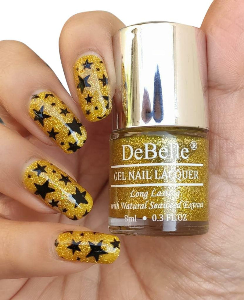 Creative nail art with DeBelle gel nail color Pegasus the lime yellow shade with glitter. Available at DeBelle Cosmetix online store.