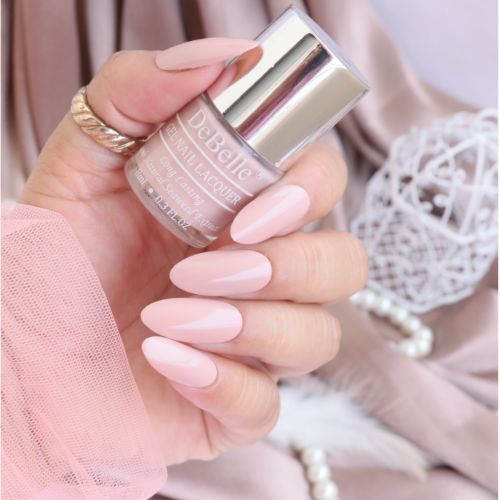 Delicat looking nails with DeBelle gel nail color Peony Bloosom at their tips. Buy online at DeBelle Cosmetix online store with COD facility.