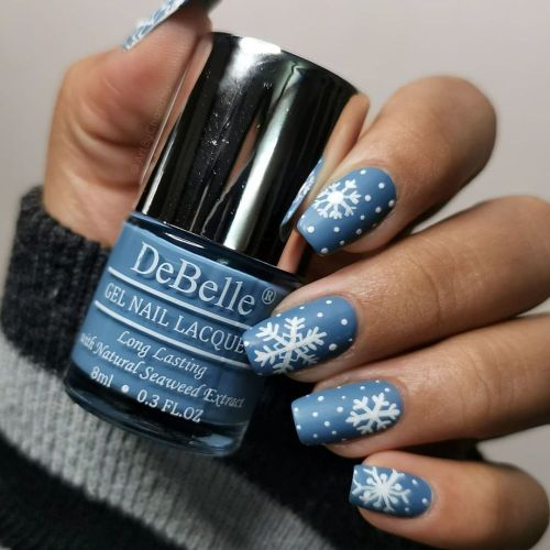 Creative nail art with DeBelle gel nail color Persian Blue . Shop online at DeBelle Cosmetix online store.