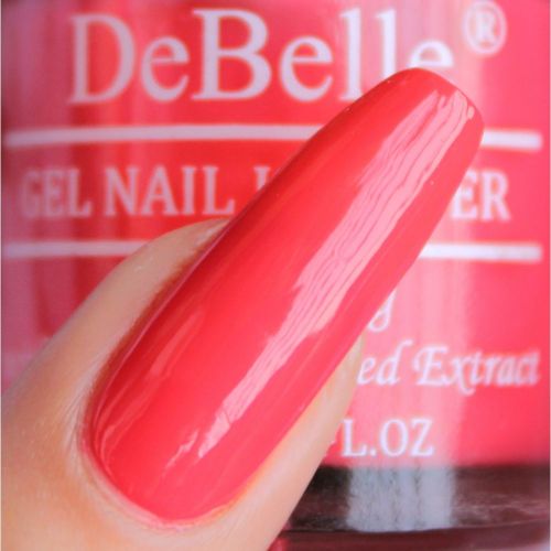 Ravishing nails with DeBelle gel nail color  Princess Belle. Buy this coral red shade enriched wirth hydrating seaweed extract at DeBelle Cosmetix online store.