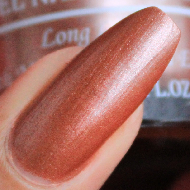 Rose gold with a metallic sheen- DeBelle gel nail color Roseate Gold. Available at DeBelle Cosmetix online store..
