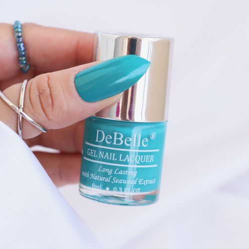 Splash this turquoise blue on your nails with DeBelle gel  nail color Royale Cocktail .Shop online at affordable price at DeBelle Cosmetix online store.