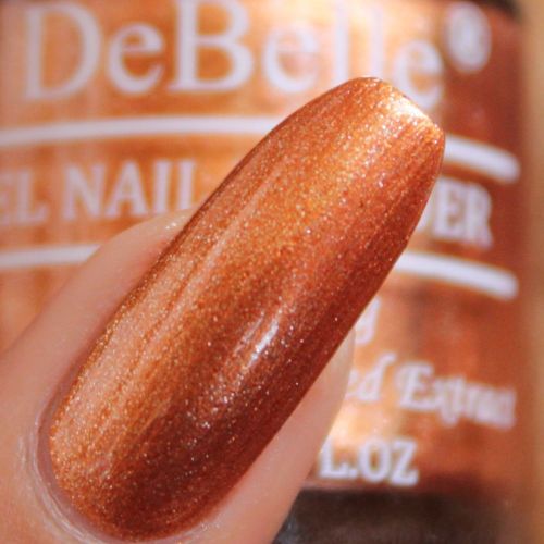 Dazzling nails with DeBelle gel nailo color Rustique Copper. Shop online with COD facility at DeBelle Cosmetix online store.