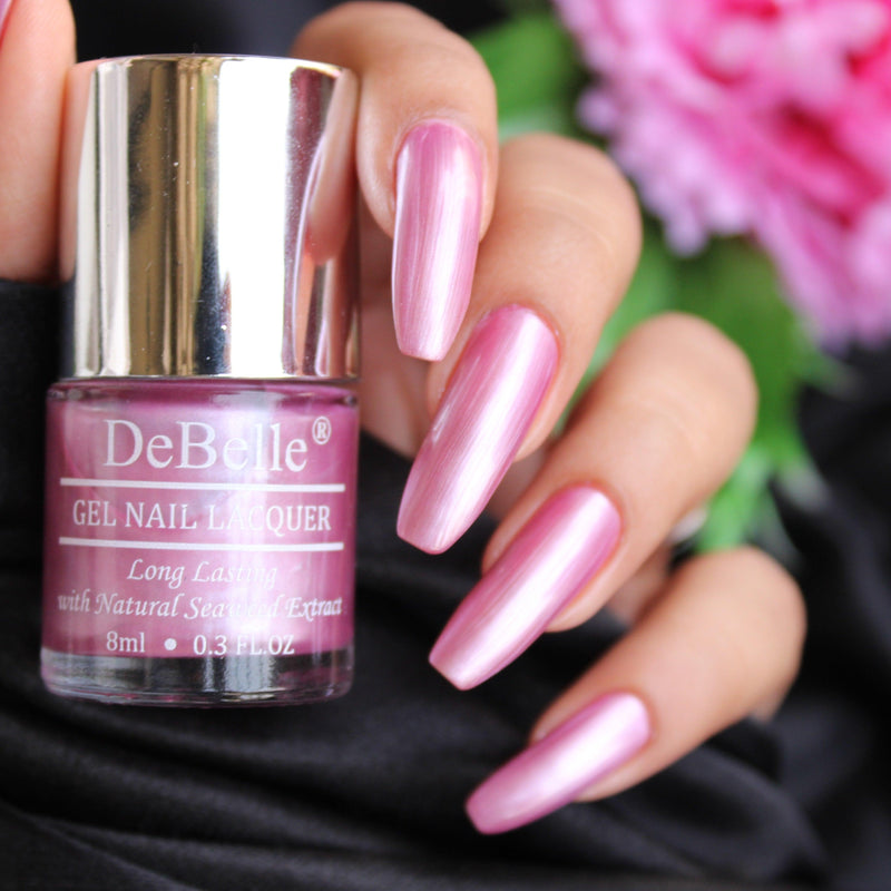 The rose pink with a metallic sheen -DeBelle gel nail color Roselin Fiesta .Shop online at DeBelle Cosmetix  online store with COD facility.