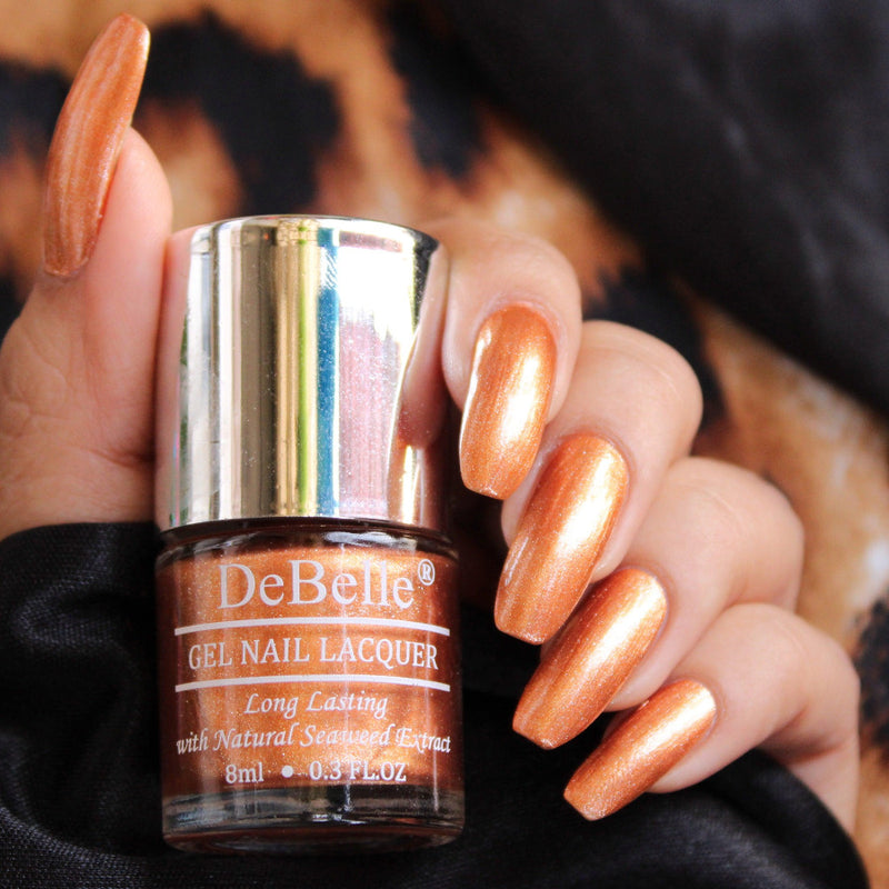 The rusty gold with a metallic sheen-Debelle gel nail color Rustique Copper.Shop online at DeBelle Cosmetix online store.