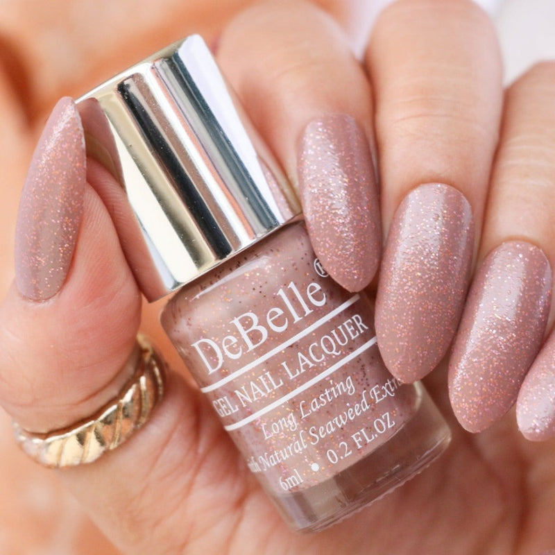 Looking out for a change  in nail colors ? Try Angelic Saira a mauve brown with copper shimmer. Available at DeBelle Cosmetix online store.