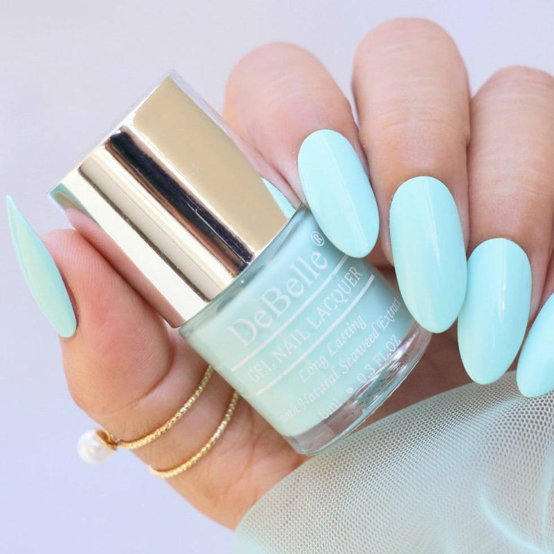 Cool is your look with DeBelle gel nail color  Mint Amour at your nail tips.  This mint blue  shade enriched with hydrating and nourishing seaweed extract is available at DeBelle Cosmetix online store.