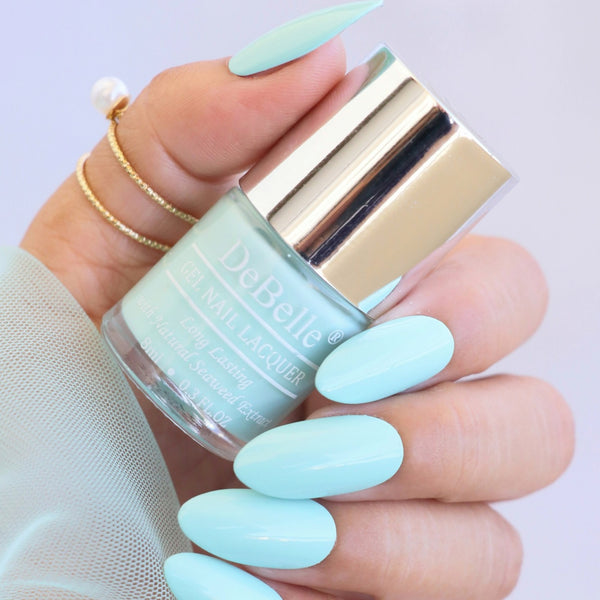 This mint blue is sure to remind you of the beaches. Buy this DeBelle gel nail color  Mint amour at DeBelle Cosmetix online store.
