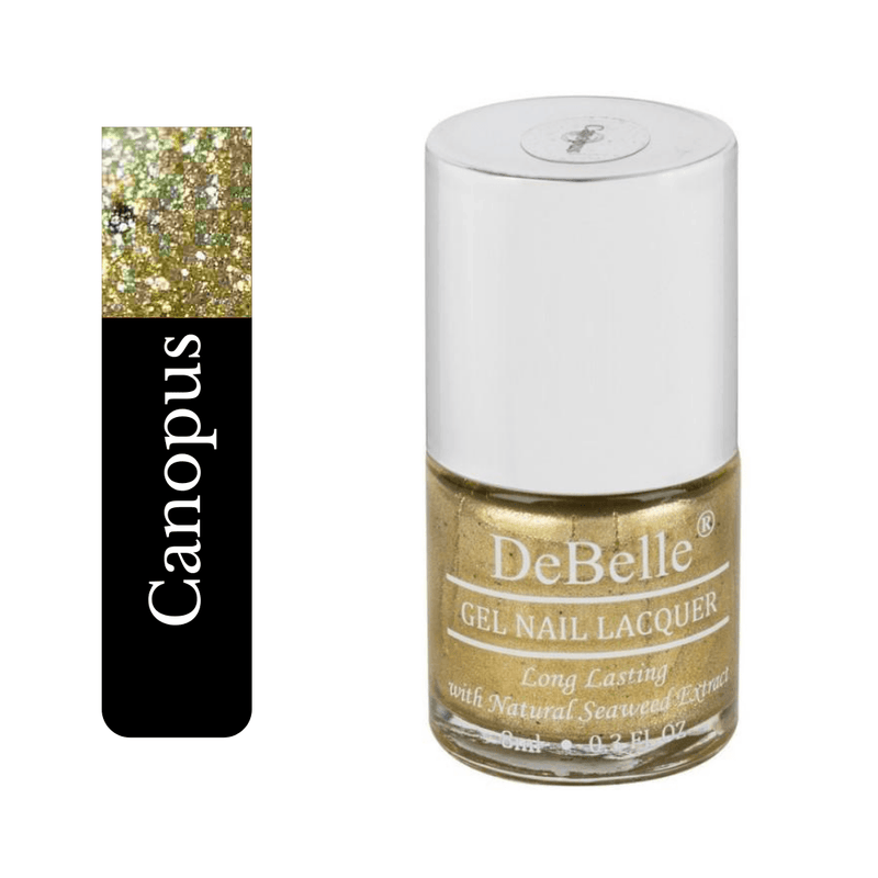 Debelle Gel Nail Paint Canopus with its combination of gold  beige with black glitter is the perfect choice  to give a complete make over for your nails this Christmas.Get this exclisuve nail paint att Debelle Cosmetix Online Store.