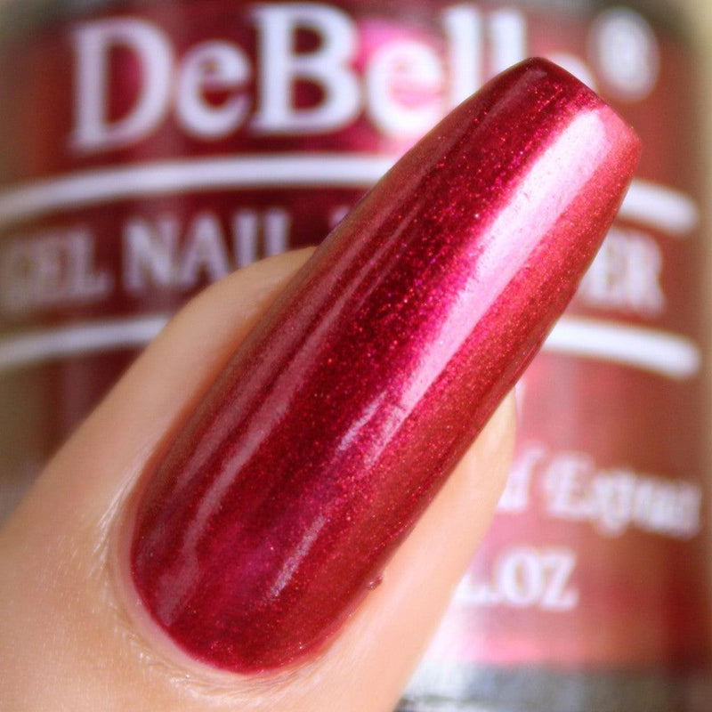 Glamorous nails with DeBelle gel nail color Anatares the deep maroon shade. Shop online at DeBelle Cosmetix online store at affordable price.