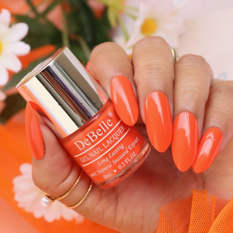  Your nail are dressed to kill  with DeBelle gel nail color Apricot Brulee at theis tips. This dusty orange shade  enriched with hydrating seaweed extract  is availble online at DeBelle Cosmetix online store.