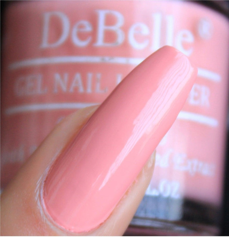 The delightful pink at your nail tips with DeBelle gel pastel pink shade Apricot Dew. Shop online from the comfort of your home at  DeBelle Cosmetix online store.