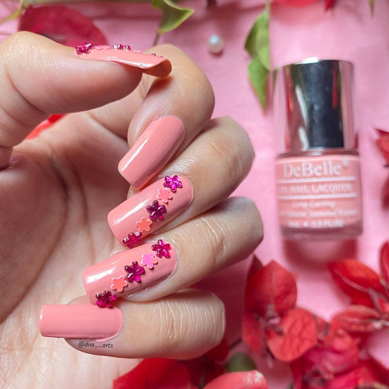 A dainty pink on your nails and a twinkling smile on your lips  will make many a heart skip a beat. Buy DeBelle gel nail paint Apricot Dew a pastel shade of pink containing hydrating seaweed extract at DeBelle Cosmetix onine store.