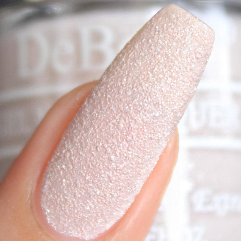 Dusty pink with glitter,this DeBelle gel nail color  Aries will make your nails  smile. Available at DeBelle Cosmetix online store.