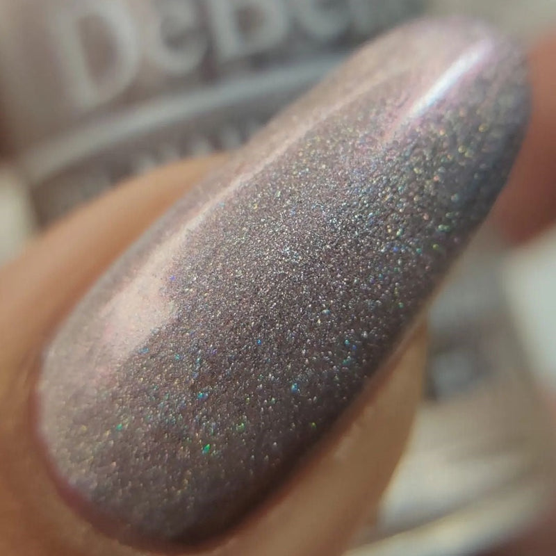 Captivating nails with DeBelle gel nail color Awesome Andrea the light purple shade with a silver shimmer. Available at DeBelle Cosmetix online store with COD facility.