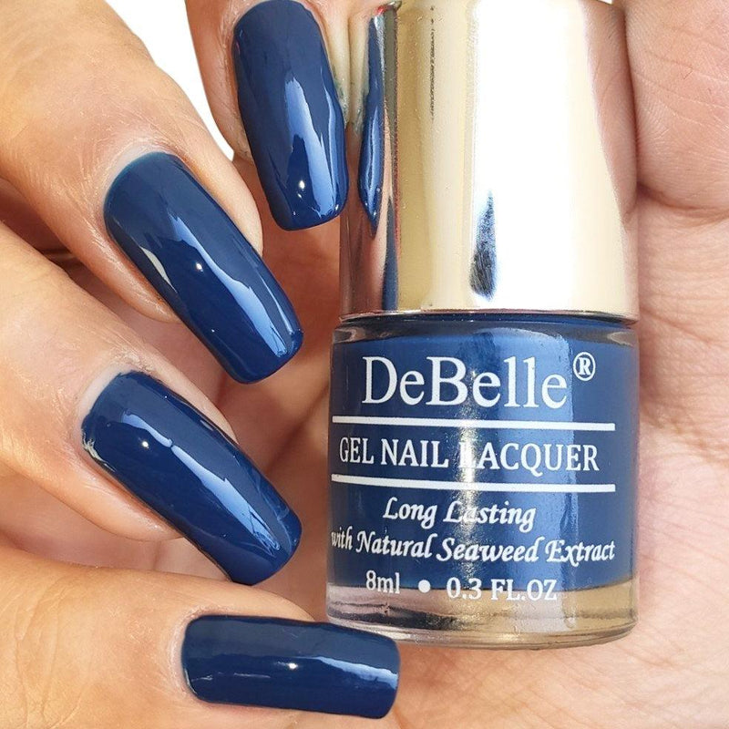 The eye catching navy blue on your  nails with DeBelle gel nail color Bleu Allure. Shop online at DeBelle Cosmetix online store.