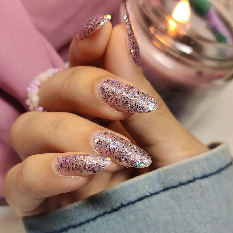 close-in view of the painted nail with the white background in a glossy shade Light purple Nail polish from DeBelle