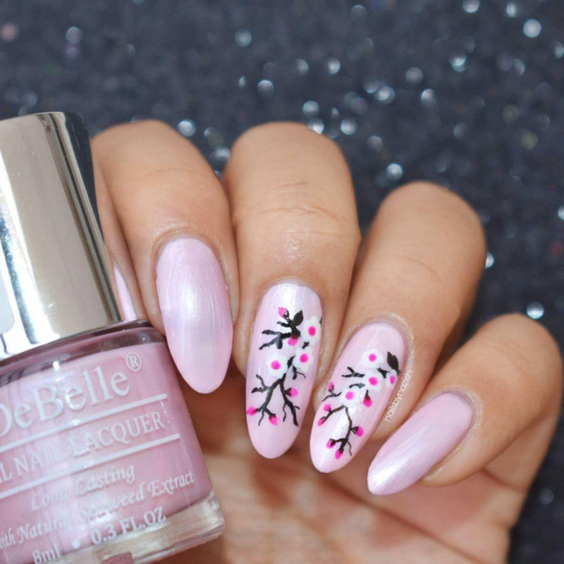 Metallic finishes and dual tone nail polish , Festive shades to elevate style for any occasion , Make nails center of attraction
