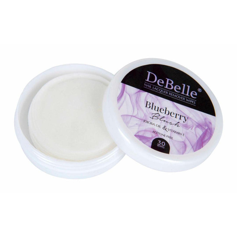 opened DeBelle Blueberry Blush Nail Lacquer Remover Wipes close-up view placed against a white background.