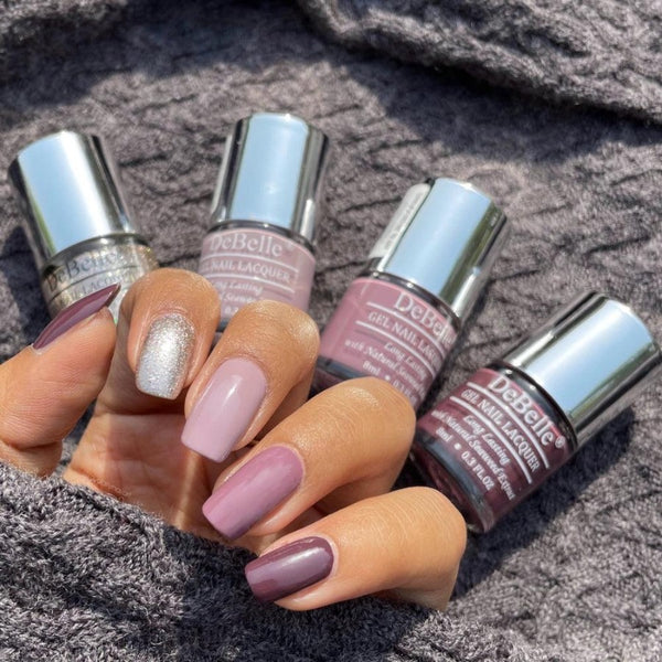 polished nails with four different shades nail polish from DeBelle