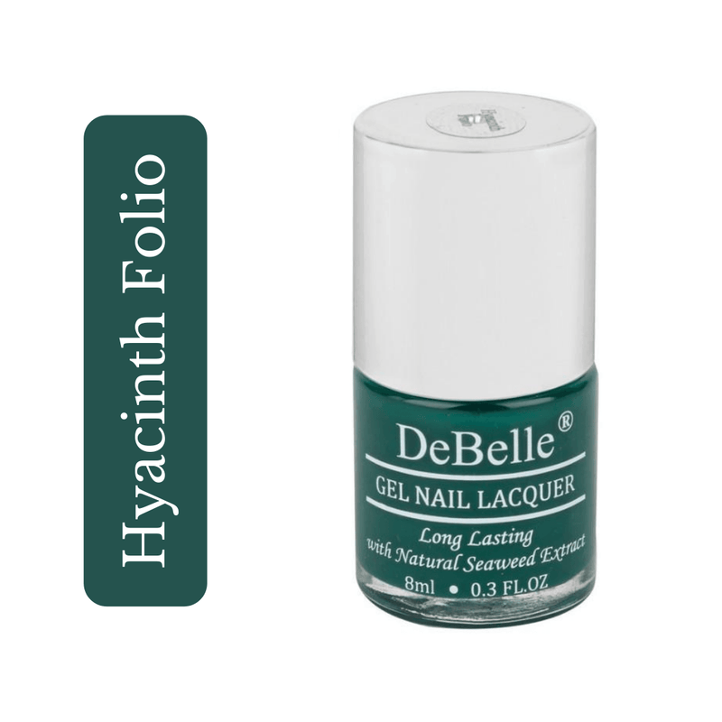 DeBelle Dark green Nail polish bottle against a white background.